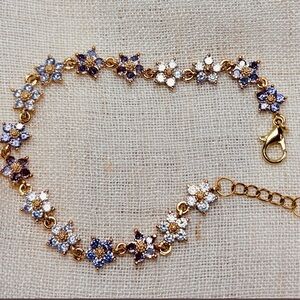 18K gold plated bracelet,blue/purple cubic zirconia flowers.7”-7.75”.  GIFT !